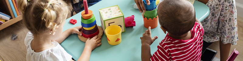 Children Playing with toys at table of Early Years Centre